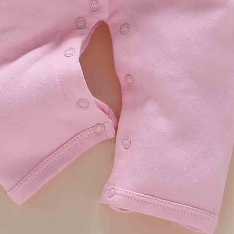 One-year-old baby wears newborn baby clothing romper jumpsuit